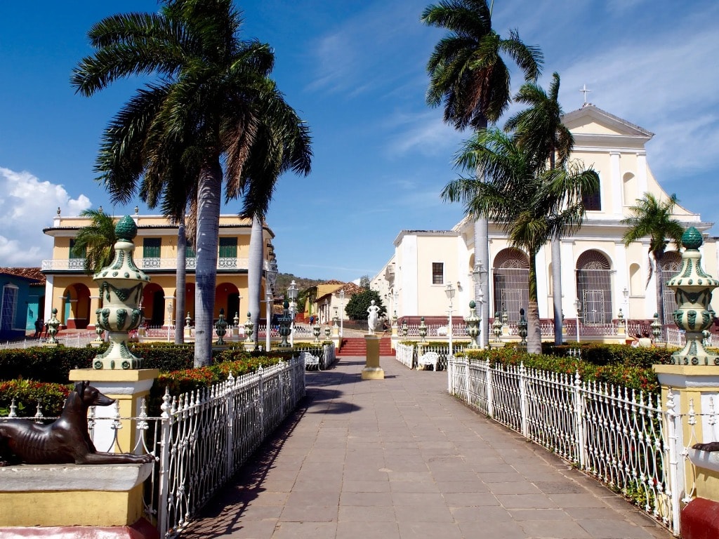 Trinidad Cuba Plaza Mayor with church and ornate iron fence