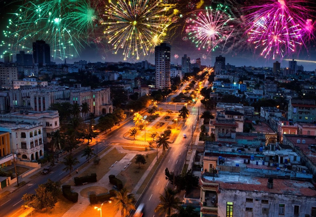 Havana Cuba fireworks over city skyline at night aerial view