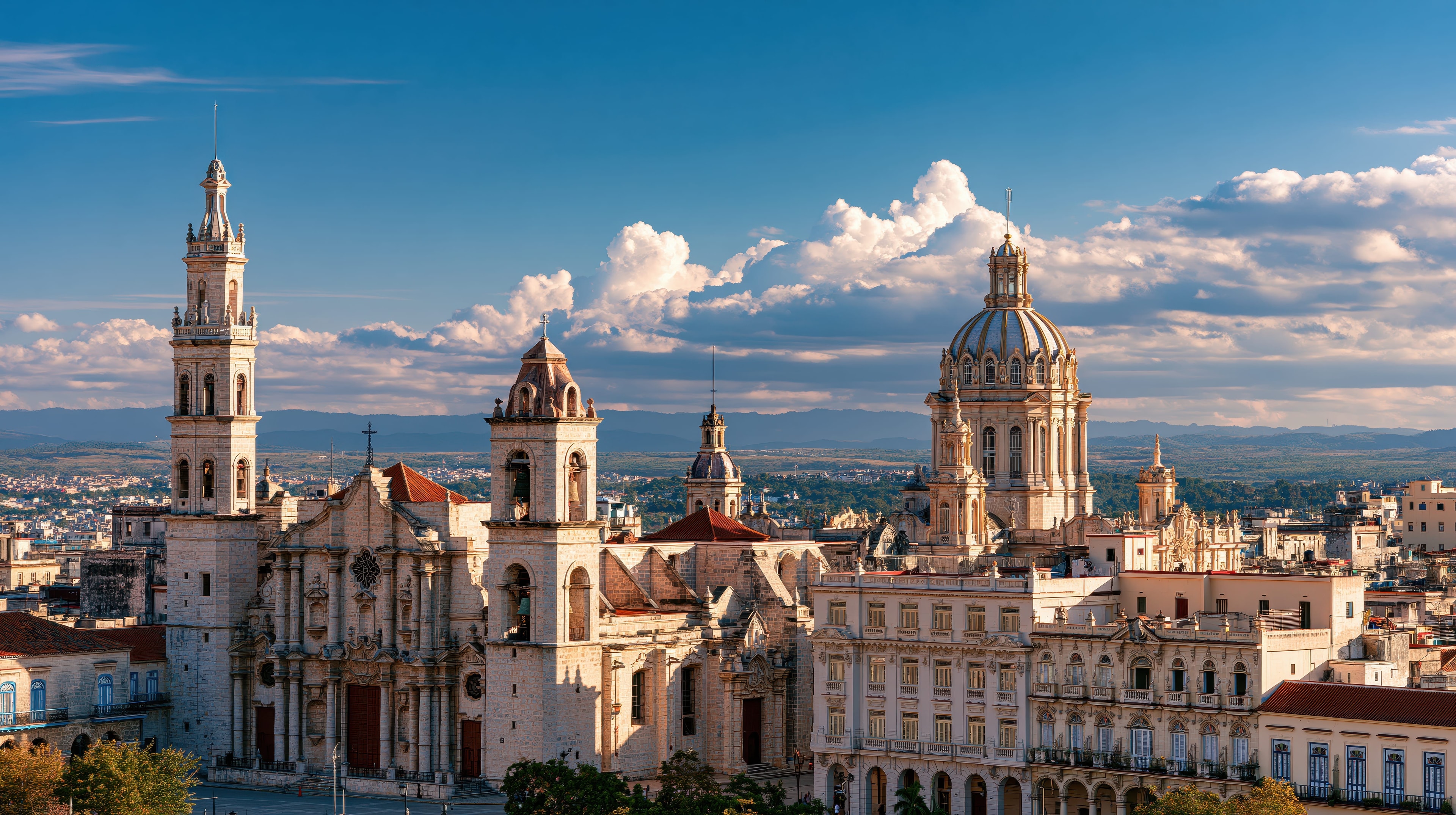Havana Cathedral and Gran Teatro baroque domes and towers rising above Old Havana rooftops, Cuba